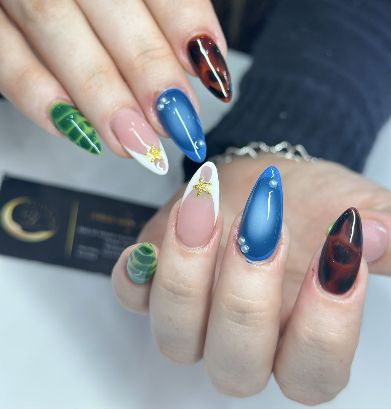 QT Nails Spa logo